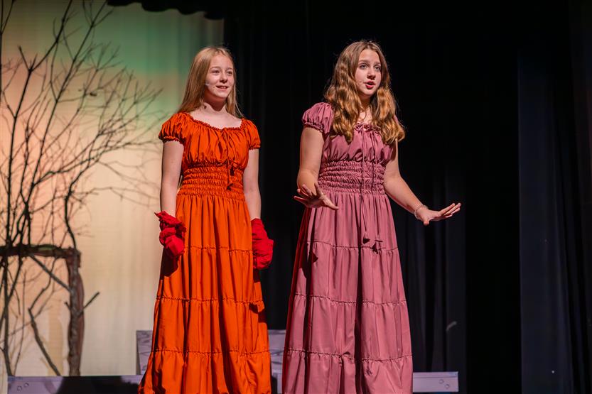 Students perform onstage